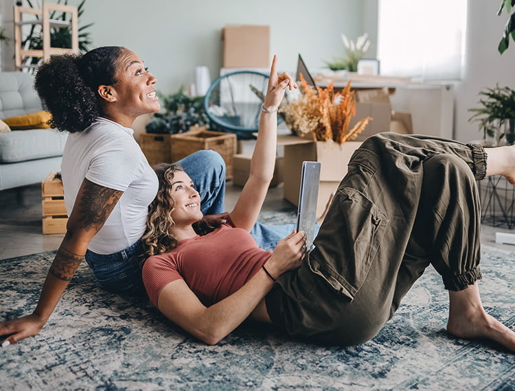 Two friends in a new apartment